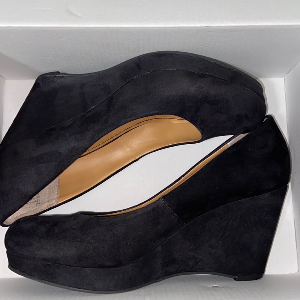 Gently used black wedges
